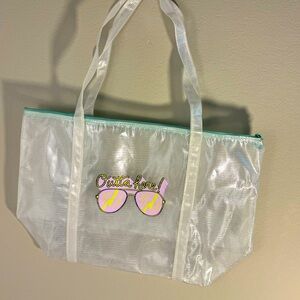Clear vinyl zip top tote